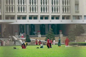Young Generation Revives Traditional Ao Dai for Lunar New Year - image 2