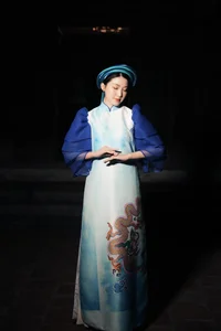 Maternity Elegance: Phuong Oanh Graces the Runway in Ao Dai at 5 Months Pregnant - image 8