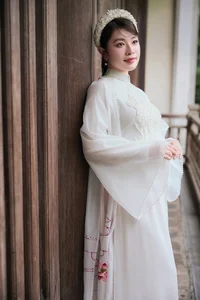 Singer Thu Hang Radiates Elegance in Traditional White Ao Dai - image 7