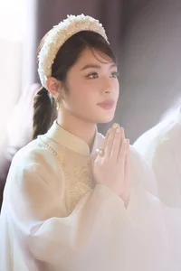 Singer Thu Hang Radiates Elegance in Traditional White Ao Dai - image 13