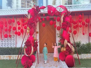 Ho Ngoc Ha Celebrates Lunar New Year with Children in Elegant Red Ao Dai - image 2