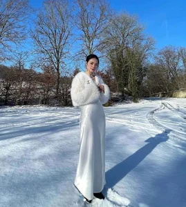 Midu Stuns in Delicate Silk Dress Amidst a Snowy Landscape - image 2