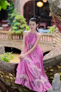 Timeless Grace: Vietnamese Woman's Modern Elegance Amidst Ancient Architecture. - image 0