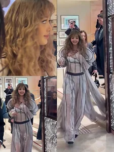 Lisa of Blackpink stuns with bold hippie curls at an international fashion event - image 9