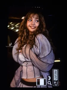 Lisa of Blackpink stuns with bold hippie curls at an international fashion event - image 3