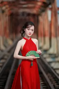 Asian Beauty: Graceful Woman in Traditional Red Dress, Radiant Charm - image 6