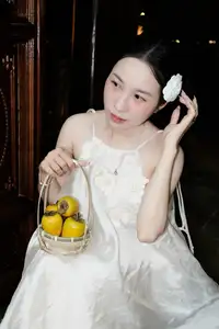 Ethereal Beauty: Woman in White Dress with Elegant Paper Umbrella at Night - image 4