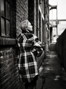 Renée Zellweger Embraces Bold Masculine Style in New Fashion Magazine Photoshoot - image 9