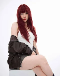 Fiery Red Hair Trends: How Top Celebrities are Rocking Bold and Vibrant Hairstyles This Season - image 0