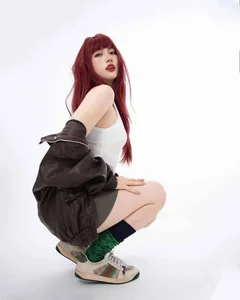 Fiery Red Hair Trends: How Top Celebrities are Rocking Bold and Vibrant Hairstyles This Season - image 11