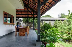 Explore Modern Tiled Roof House: Traditional charm meets green living, ideal architecture for a peaceful retirement. - image 11