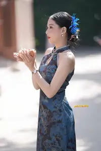 Captivating Asian Beauty: Elegant Woman in Blue Cheongsam with Traditional Fan - image 6
