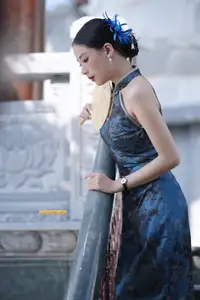 Captivating Asian Beauty: Elegant Woman in Blue Cheongsam with Traditional Fan - image 12