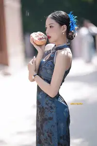 Captivating Asian Beauty: Elegant Woman in Blue Cheongsam with Traditional Fan - image 10
