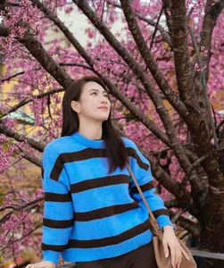 Elegant Minimalist Fashion: Phuong Anh Dao’s Sophisticated Style and Natural Beauty in a Lush Garden Setting - image 6