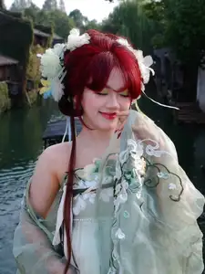 Bao Han Helia Transforms into a Fairy in Ancient Chinese Town: A Mesmerizing Hanfu Photoshoot - image 2