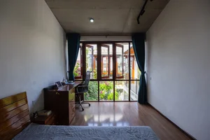 Innovative 64m2 Townhouse Design: An Urban Bird’s Nest Surrounded by Lush Greenery - image 0