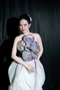Radiant Actress in Elegant Stage Costume, Her Graceful Beauty Captivates Every Gaze on Stage. - image 1