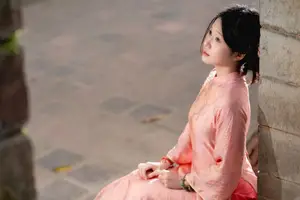 Graceful Asian Young Woman in Traditional Pink Attire: Timeless Beauty by an Ancient Wall - image 12