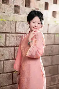 Graceful Asian Young Woman in Traditional Pink Attire: Timeless Beauty by an Ancient Wall - image 11