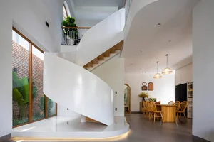 Stunning 170m² Da Nang Home: Terracotta Facade and Spiral Stairs - image 1