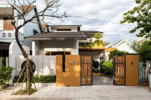 Stunning 170m² Da Nang Home: Terracotta Facade and Spiral Stairs - image 0