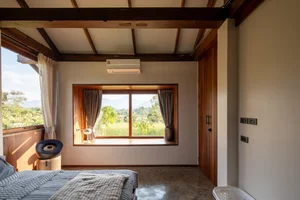 Sustainable Living in Chiang Mai: A Single-Story Retreat Crafted from Recycled Wood and Natural Elements - image 14