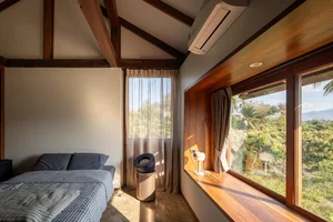 Sustainable Living in Chiang Mai: A Single-Story Retreat Crafted from Recycled Wood and Natural Elements - image 16