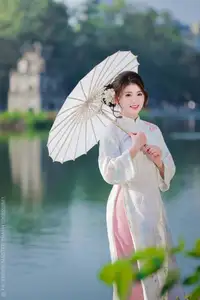 Enchanting East Asian Beauty: A Serene Muse in White Cheongsam under Soft Sunlight by the Lake. - image 5