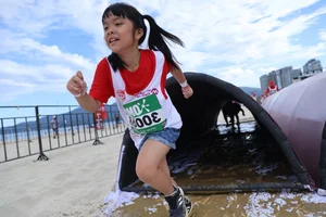 Inspiring Moments: 1,000 Children Participate in Beach Run in Da Nang - image 0