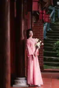 Pink Ao Dai Charm: Discover the Ethereal Beauty of Vietnamese Women in Ancient Heritage Settings. - image 8