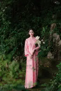 Pink Ao Dai Charm: Discover the Ethereal Beauty of Vietnamese Women in Ancient Heritage Settings. - image 11