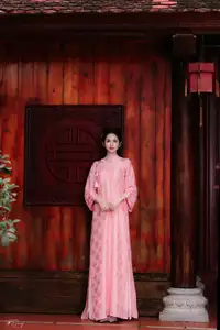 Pink Ao Dai Charm: Discover the Ethereal Beauty of Vietnamese Women in Ancient Heritage Settings. - image 10
