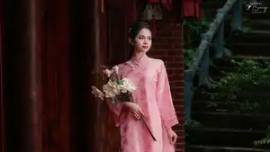 Pink Ao Dai Charm: Discover the Ethereal Beauty of Vietnamese Women in Ancient Heritage Settings. - image 9