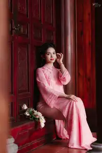 Pink Ao Dai Charm: Discover the Ethereal Beauty of Vietnamese Women in Ancient Heritage Settings. - image 5
