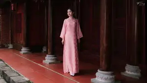 Pink Ao Dai Charm: Discover the Ethereal Beauty of Vietnamese Women in Ancient Heritage Settings. - image 0
