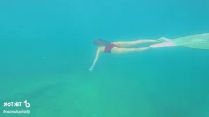 Stunning Beach Fashion at Vĩnh Hy Bay: Diệp Lâm Anh’s Luxury Travel Inspiration and Swimwear Trends for a Perfect Vietnam Tropical Escape. - image 4