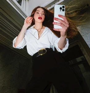 Timeless Elegance: 3 Ways to Style a White Shirt Inspired by Ho Ngoc Ha for Women Over 40 - image 0