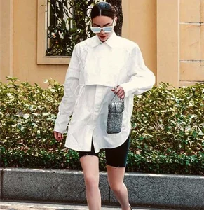 Timeless Elegance: 3 Ways to Style a White Shirt Inspired by Ho Ngoc Ha for Women Over 40 - image 7