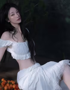 Jun Vu's New Photoshoot Goes Viral: Alluring Dewy Beauty with Cherry Tomatoes - image 1