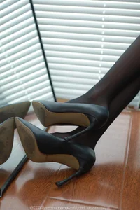 Tuan Tuan in Black High Heels IESS Fashion Spotlight - image 6