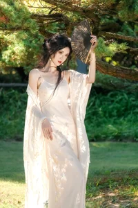 Ethereal Beauty in a White Flower Field: A Muse Under the Sun - image 12
