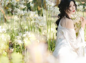 Ethereal Beauty in a White Flower Field: A Muse Under the Sun - image 13