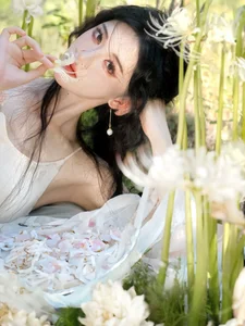 Ethereal Beauty in a White Flower Field: A Muse Under the Sun - image 3