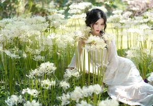 Ethereal Beauty in a White Flower Field: A Muse Under the Sun - image 17