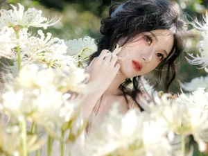 Ethereal Beauty in a White Flower Field: A Muse Under the Sun - image 9
