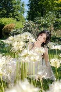 Ethereal Beauty in a White Flower Field: A Muse Under the Sun - image 4