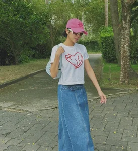 Dieu Nhi Embraces Feminine Charm with Stunning Dress and Skirt Outfits - image 2