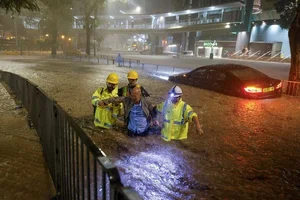 Hong Kong Paralysed by Record-Breaking Rainfall in 140 Years - image 5