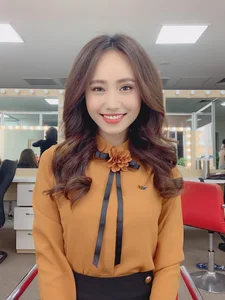 The Radiant Beauty and Professional Style of VTV Weather Forecast Presenters - image 38